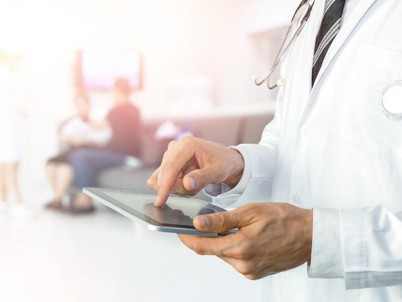 Doctor using their tablet