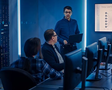 Team of Professional IT Developers Have Meeting