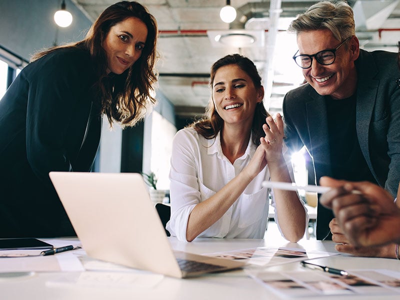 Business-people-selecting-models-for-advertising-project