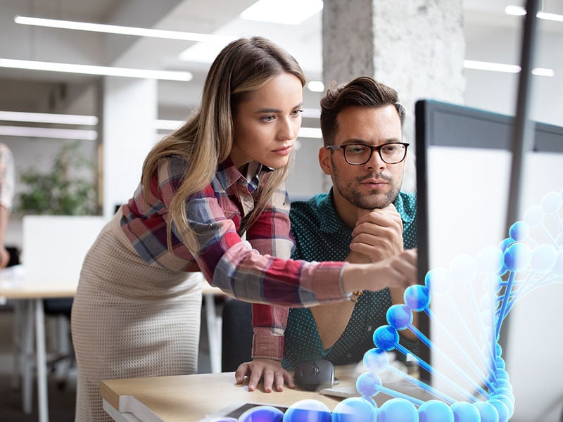 Group-of-business-people-and-software-developers-working-as-a-team-in-office-1