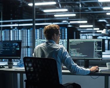 IT-Specialist-Uses-Computer-in-Data-Center