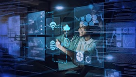 IT team member working on a digital transformation strategy at her desk with an AI and technology overlay